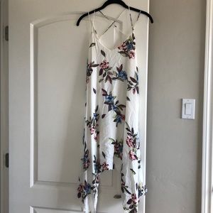 Flowy white floral dress with strap it back
